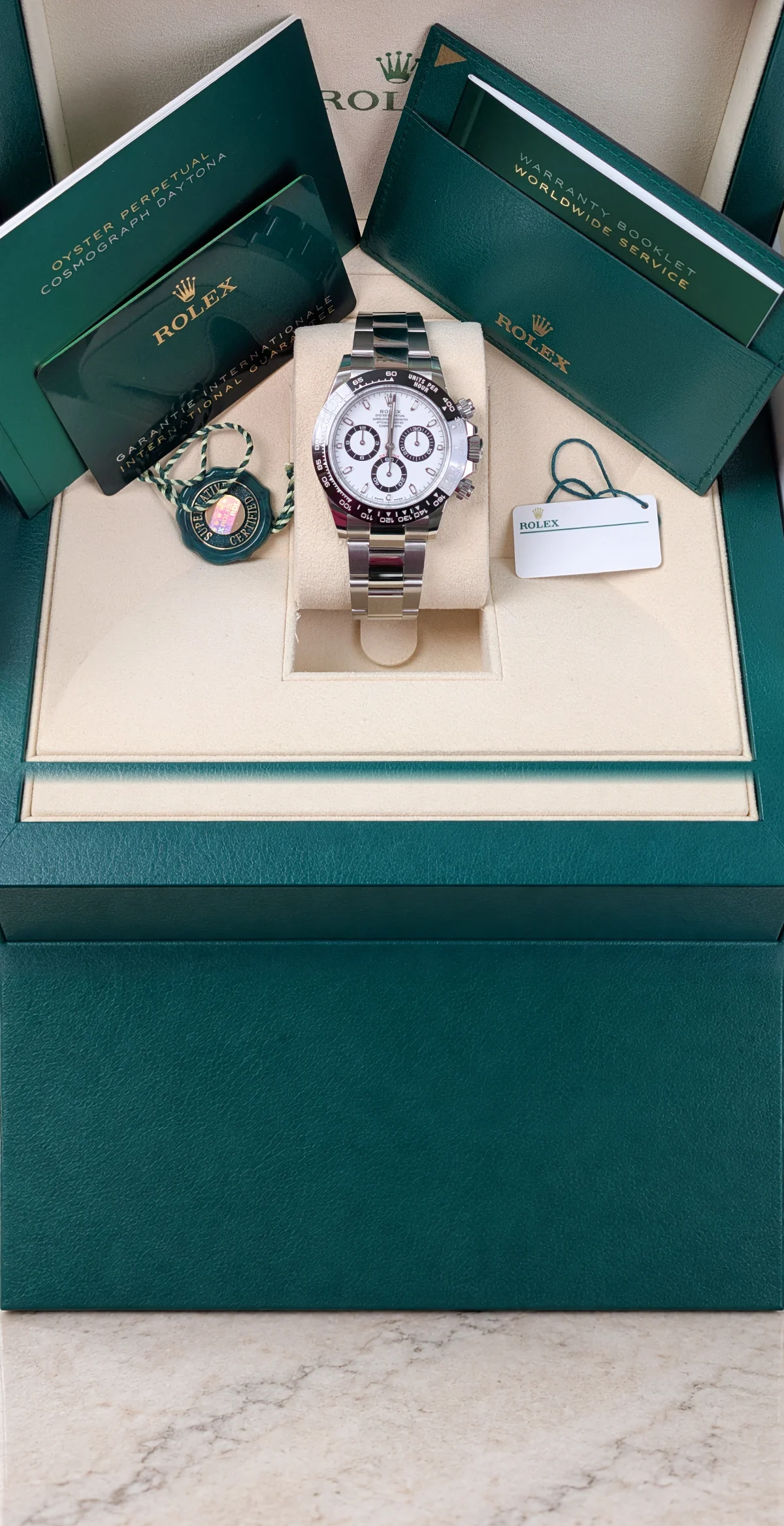 Rolex Cosmograph Daytona 116500LN de esfera blanca con caja, tarjeta de garantía y documentación original