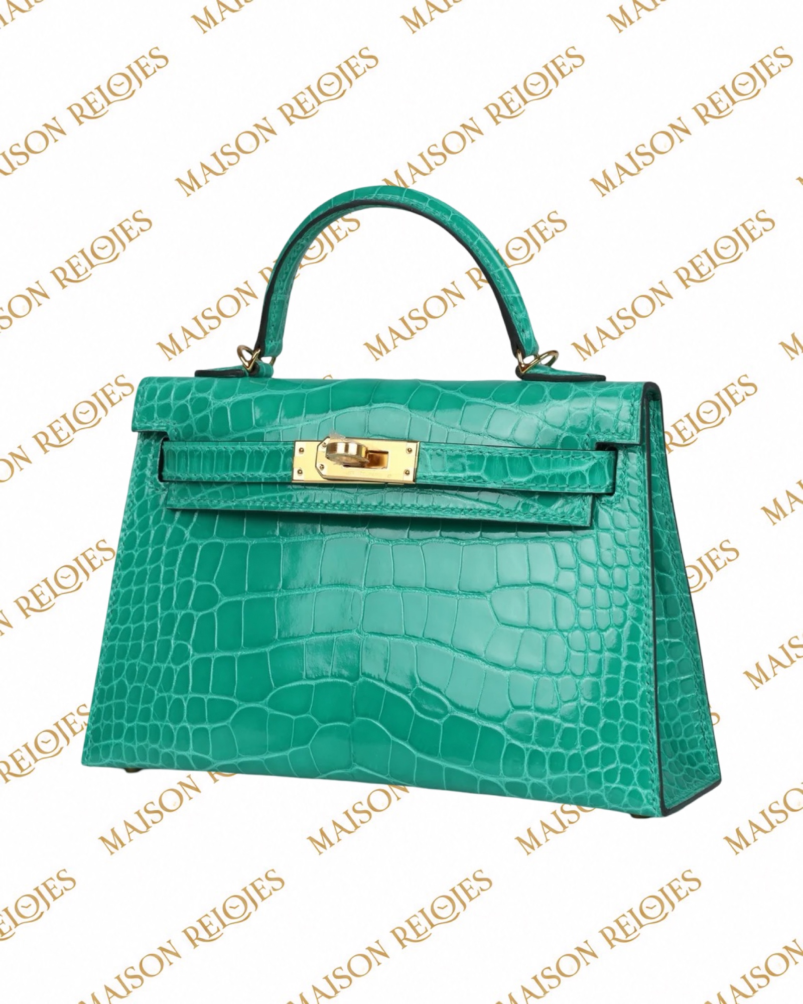Hermès Mini Kelly 20 Sellier Vert Jade en aligátor brillante con herrajes dorados GHW — vista tres cuartos