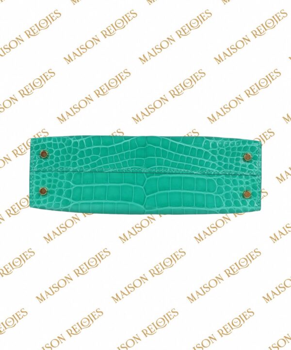 Hermès Mini Kelly 20 Sellier Vert Jade en aligátor brillante con herrajes dorados GHW — detalle de la base