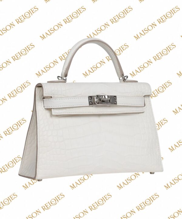 Hermès Mini Kelly 20 Crème Chantilly en aligátor mate con herrajes PHW — vista tres cuartos izquierda
