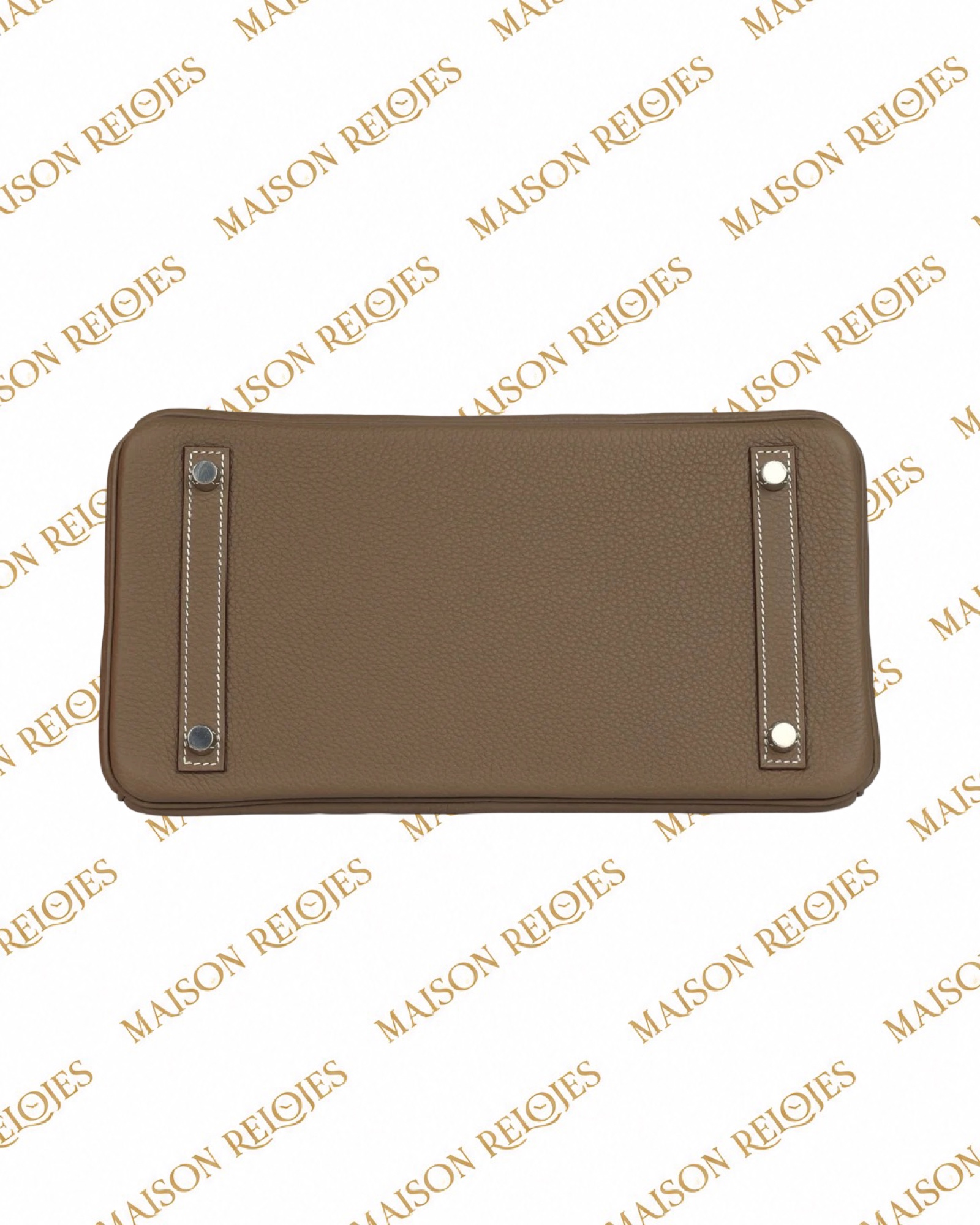Hermès Birkin 25 Étoupe en piel Togo con herrajes Paladio (PHW): base con cuatro apoyos metálicos
